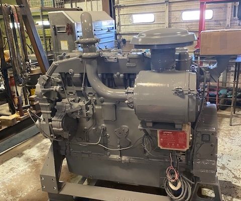 Overhauled Cat G3406 engine on a skid in the shop